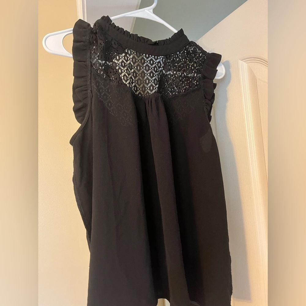 Beautiful comfy black top. Lilly wise